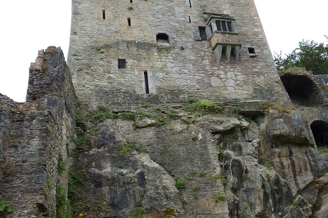 Cliffs of Moher & Bunratty Castle Day Tour - Cliffs of Moher Visitor Centre: views, puffins, and the O’Brien round tower