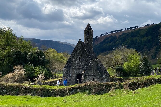 Day Tour from Dublin: Wicklow Mountains, Glendalough, Powerscourt - Guinness Lake (Lough Tay), a scenic stop with stories and film trivia