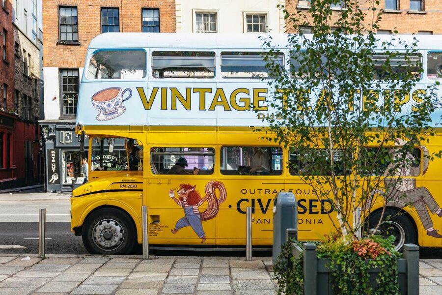 Dublin: Afternoon Tea Vintage Bus Tour - The vintage bus experience: seating, 1960s tunes, and how to get the best view