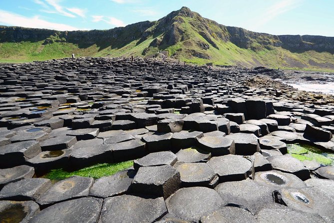Dublin to Belfast Black Cab, Dunluce Castle and Giant's Causeway - The Peace Wall stop: why the city looks divided