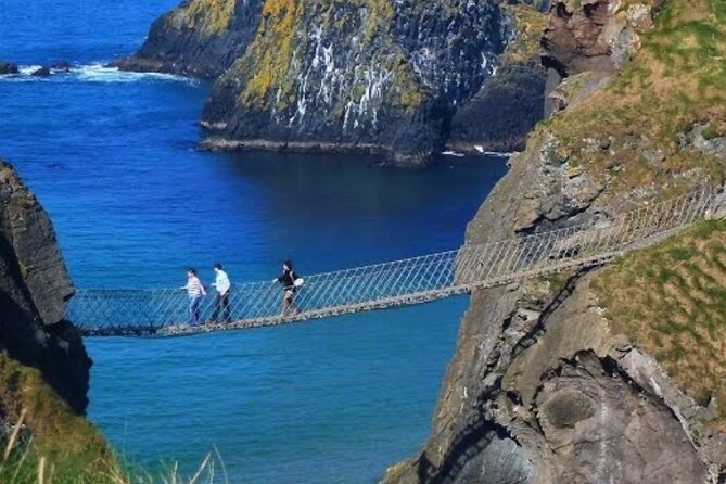 Giants Causeway and Belfast 2 Days with Private Chauffeur Tour - Dunluce Castle ruins on the coast: the story part of the cliff
