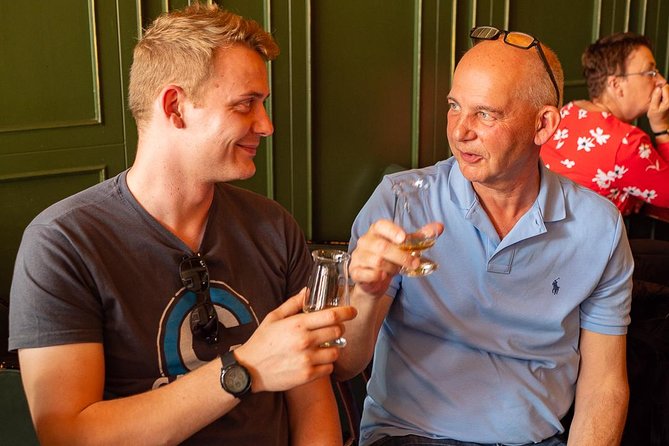 Premium Whiskey and Food Tasting in Dublin - Entering two classic Dublin bars for a structured whiskey tasting